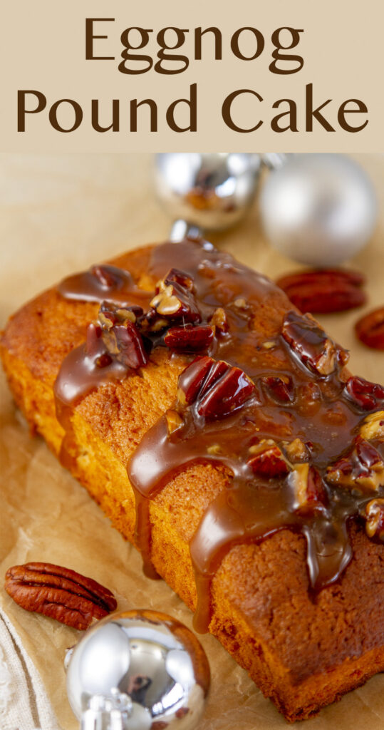 Eggnog Pound Cake topped with pecan caramel and surrounded by Christmas ornaments, title on top of image.