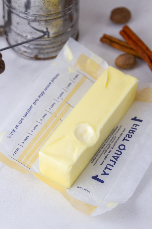 softened butter with a finger indent in it.