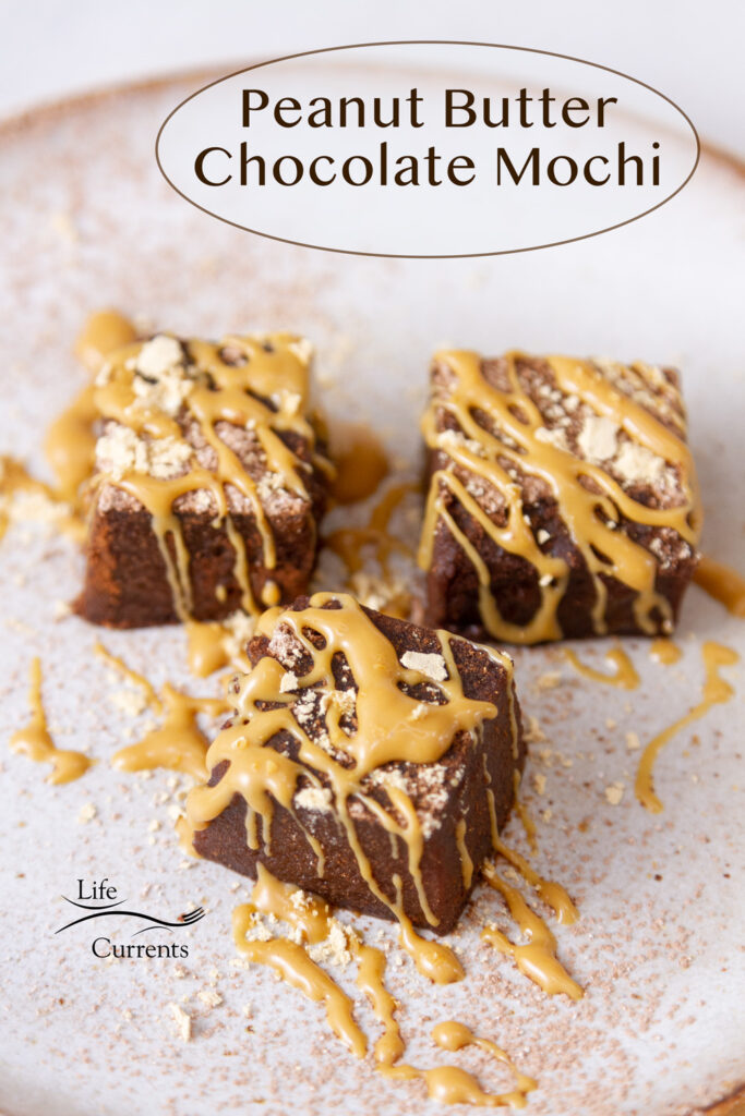 Three squares of chocolate mochi on a plate garnished with peanut butter, title on image: Peanut Butter Chocolate Mochi.
