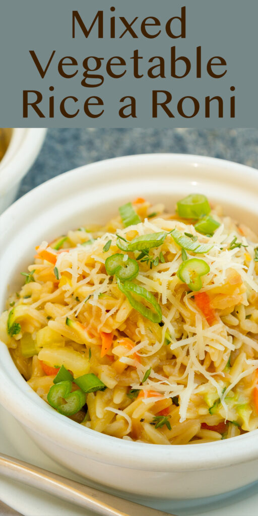 a white bowl with homemade Mixed Vegetable Rice a Roni side dish inside.