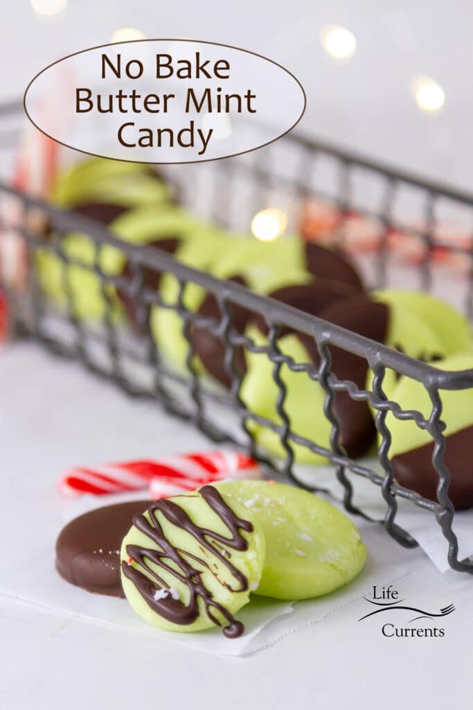 No Bake Butter Mint Candy in a wire tray with three candies in front, twinkle lights in the background.