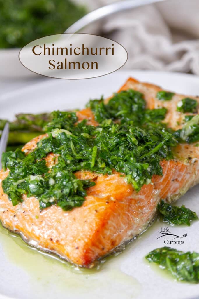 a piece of cooked salmon with Chimichurri sauce on top on a white plate, title Chimichurri Salmon on upper left.