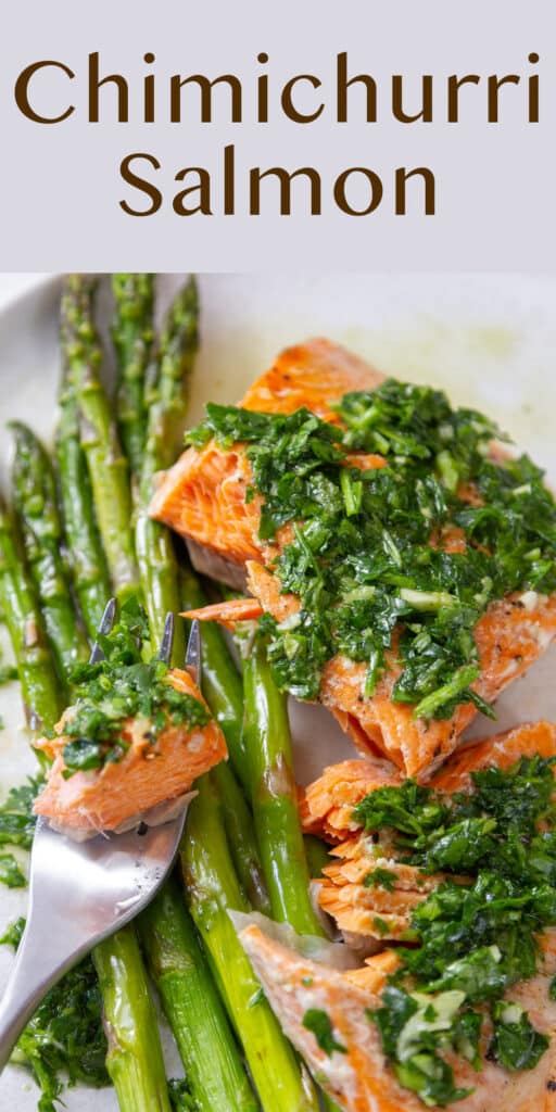 Looking down on a plate with Air Fryer Chimichurri Salmon and asparagus on it with a fork.