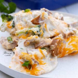 square crop of a serving of pierogi casserole on a white plate.