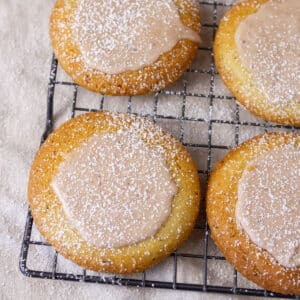 square crop of chai cookies on a wire cooling rack.