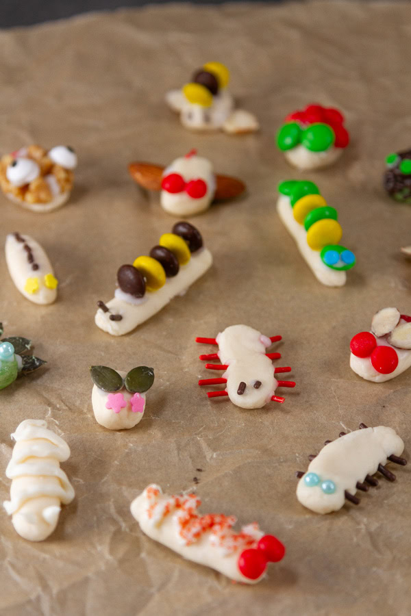 candy bugs on brown parchment paper.