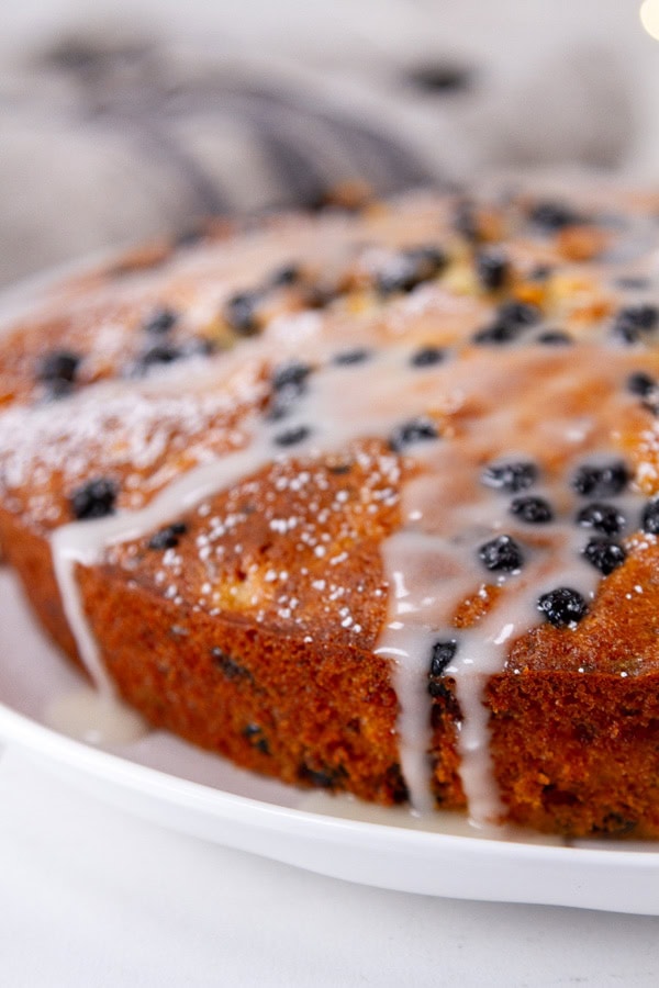 cake with icing drizzled on it.