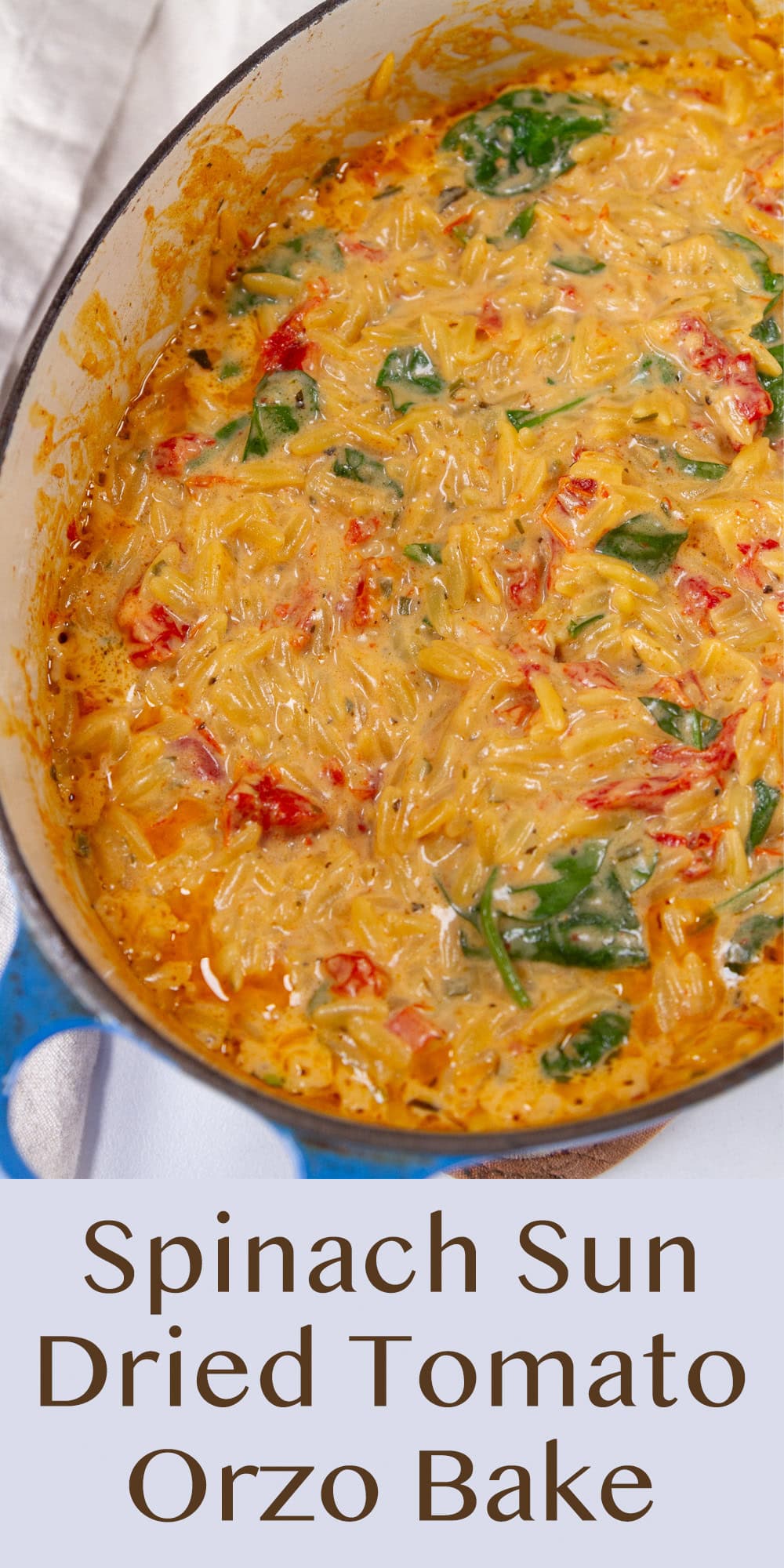 looking down into a casserole dish with baked orzo in it.