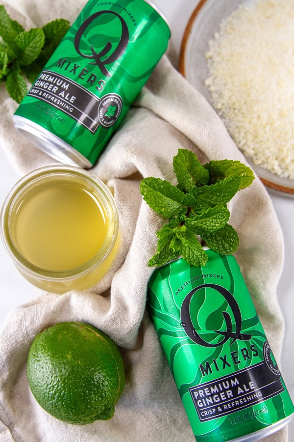 ingredients for this drink: lime, ginger syrup, Q mixers ginger ale, fresh mint, and sugared ginger for the rim.