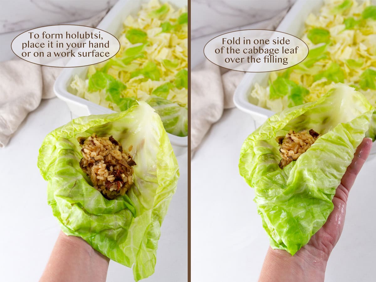 a hand holding a cooked cabbage leaf with rice filling inside and folding it into a roll.