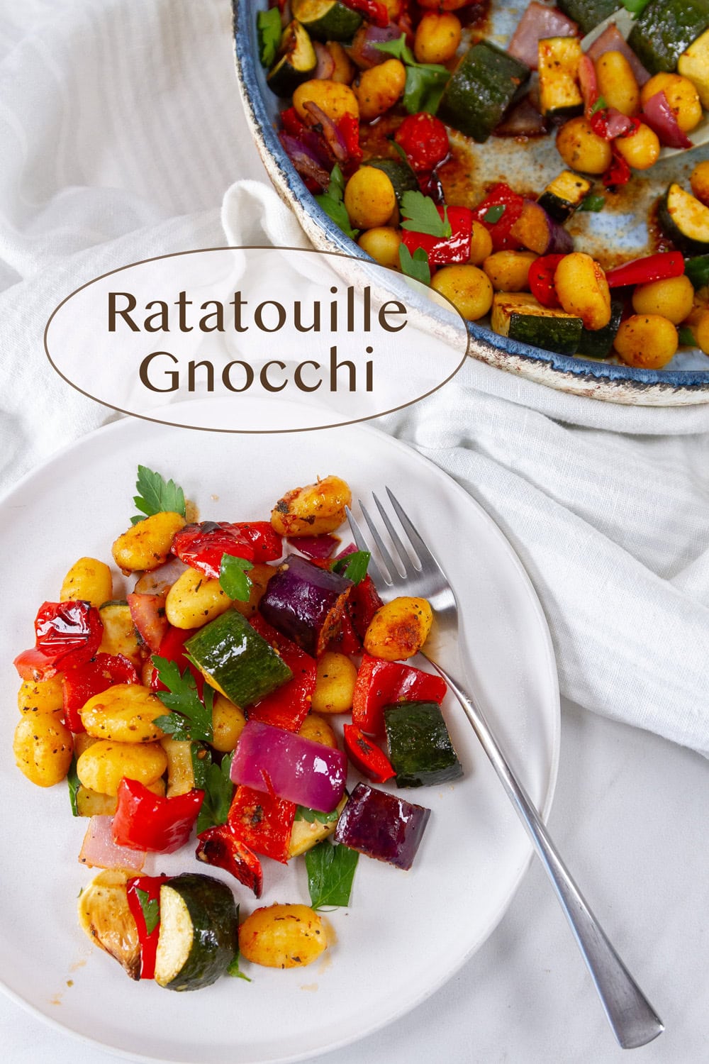 a small plate with Ratatouille Gnocchi in the lower left and the serving bowl on the upper right.