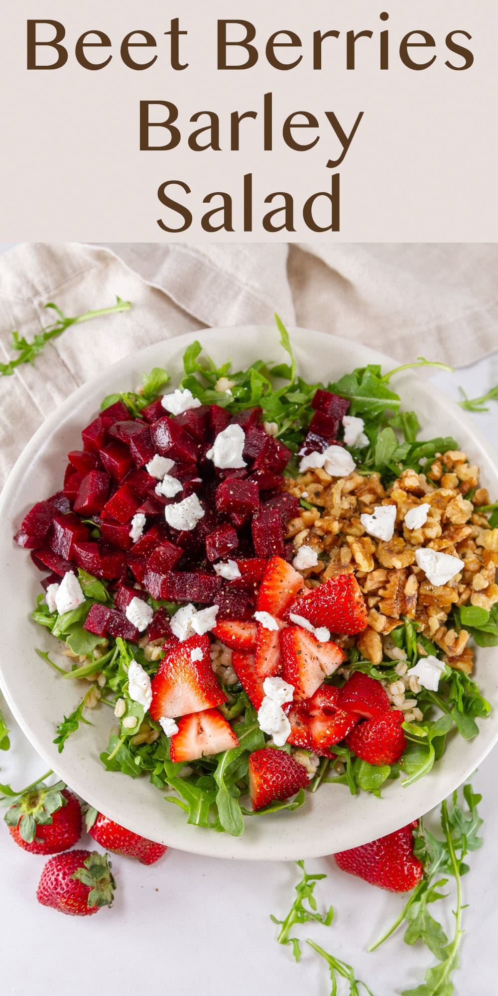 a white bowl filled with berries, beets, and walnuts.