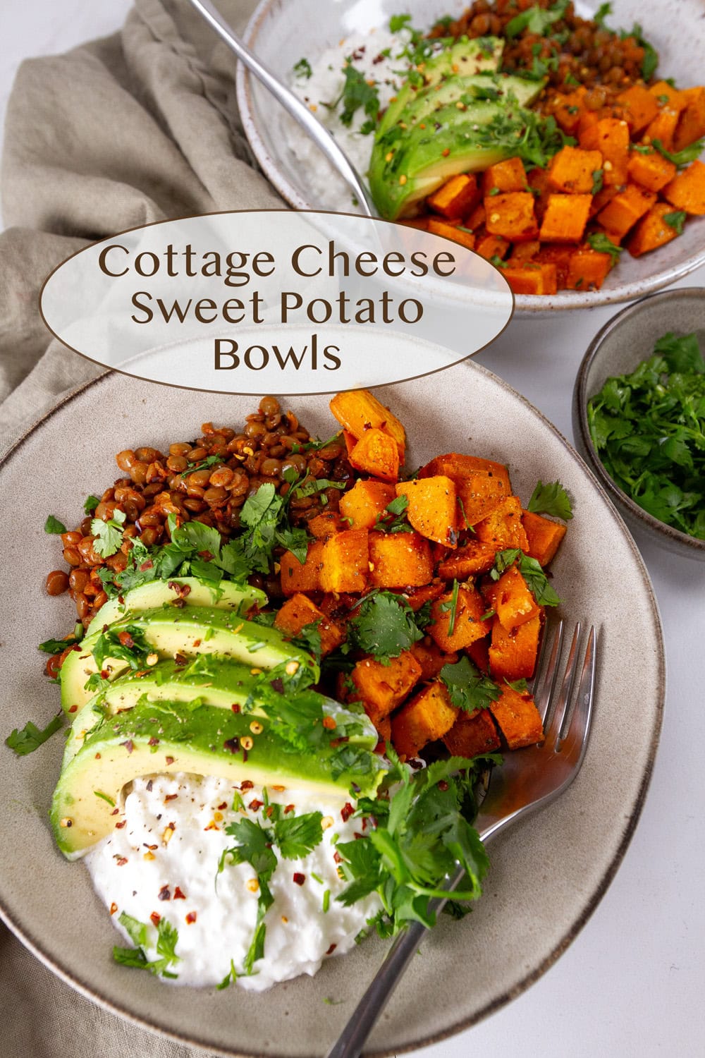 a white bowl filled with cooked lentils, sweet potatoes, cottage cheese, and avocado and a fork on the lower right.