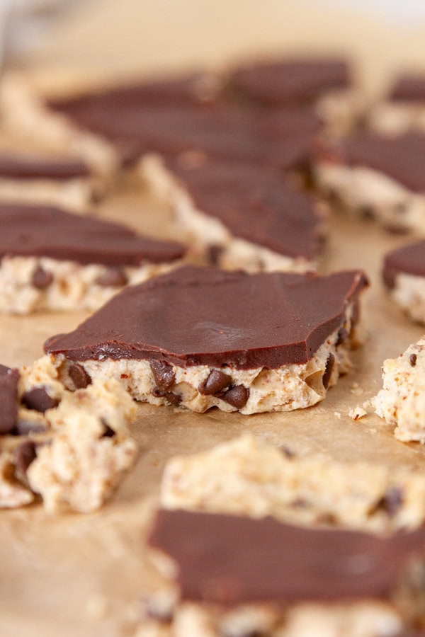 pieces of dessert bark on parchment paper.