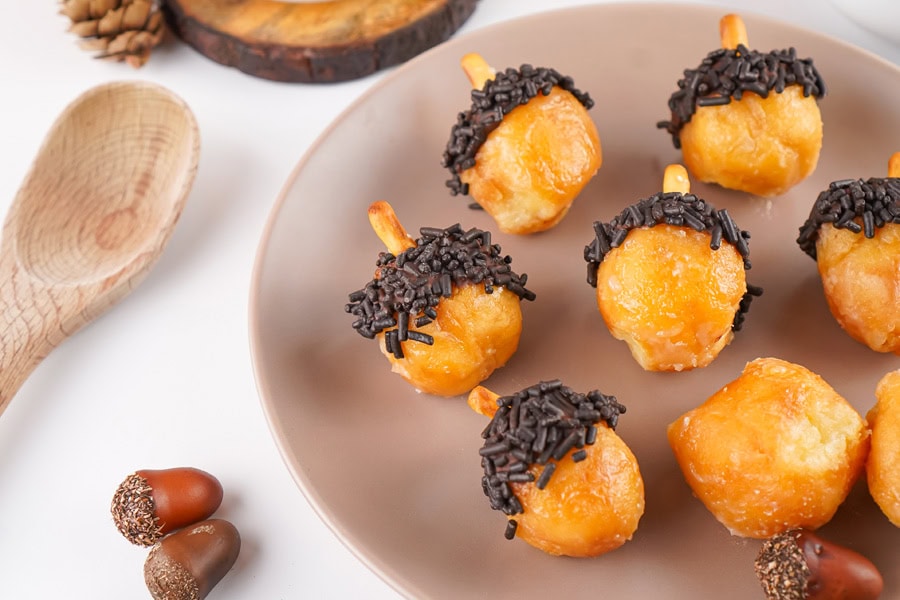 Cute fall-themed donut holes decorated like acorns.