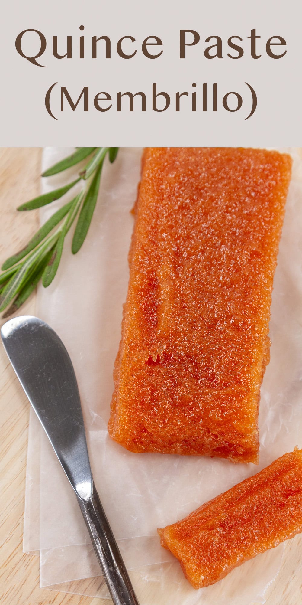 looking down on a square of Membrillo made from quinces with s spreader next to it.