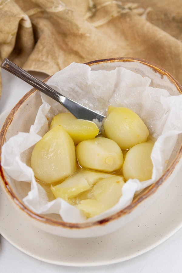 Roasted elephant garlic in a small dish.