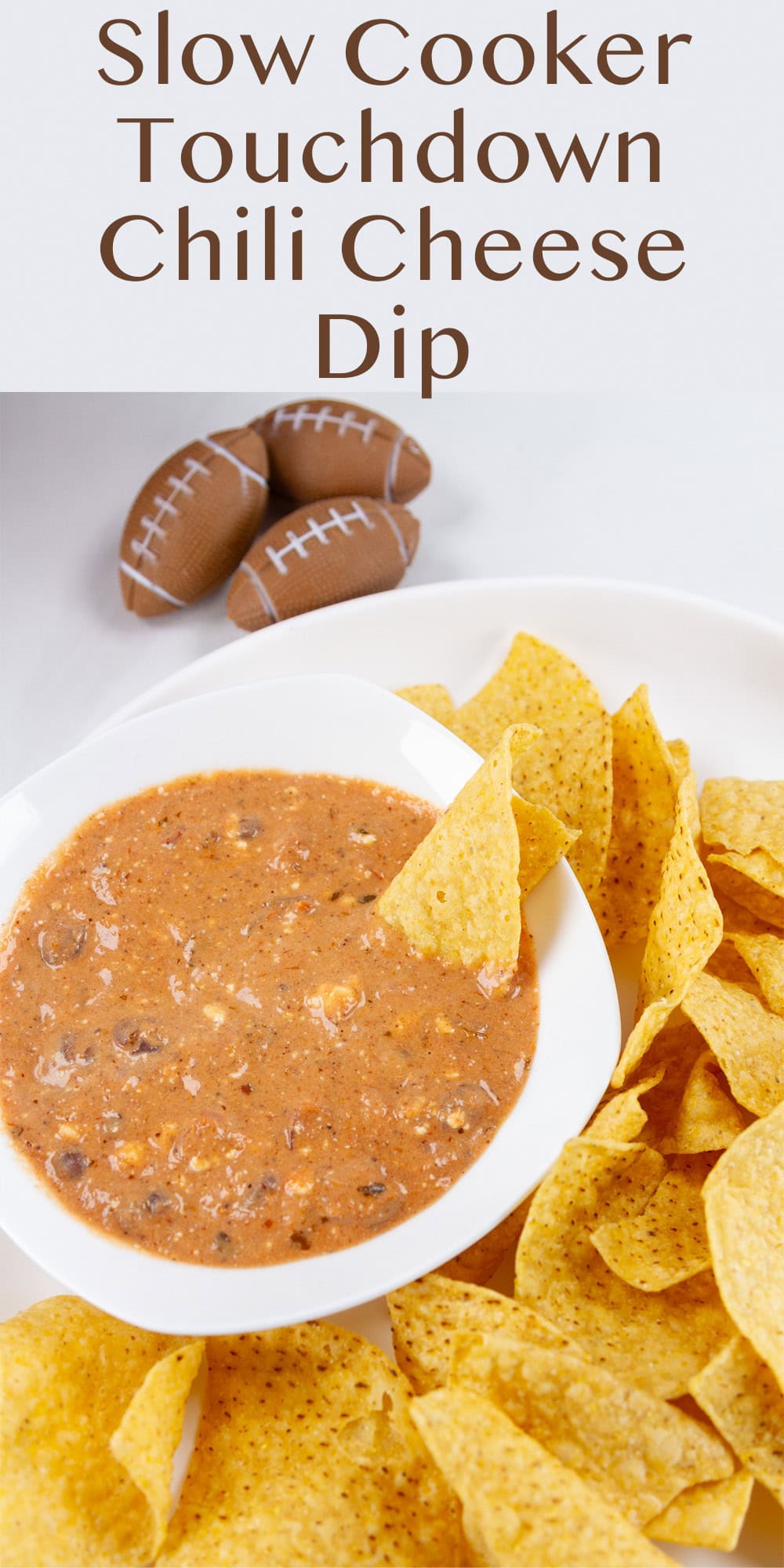 chili dip in a small white bowl with tortilla chips.