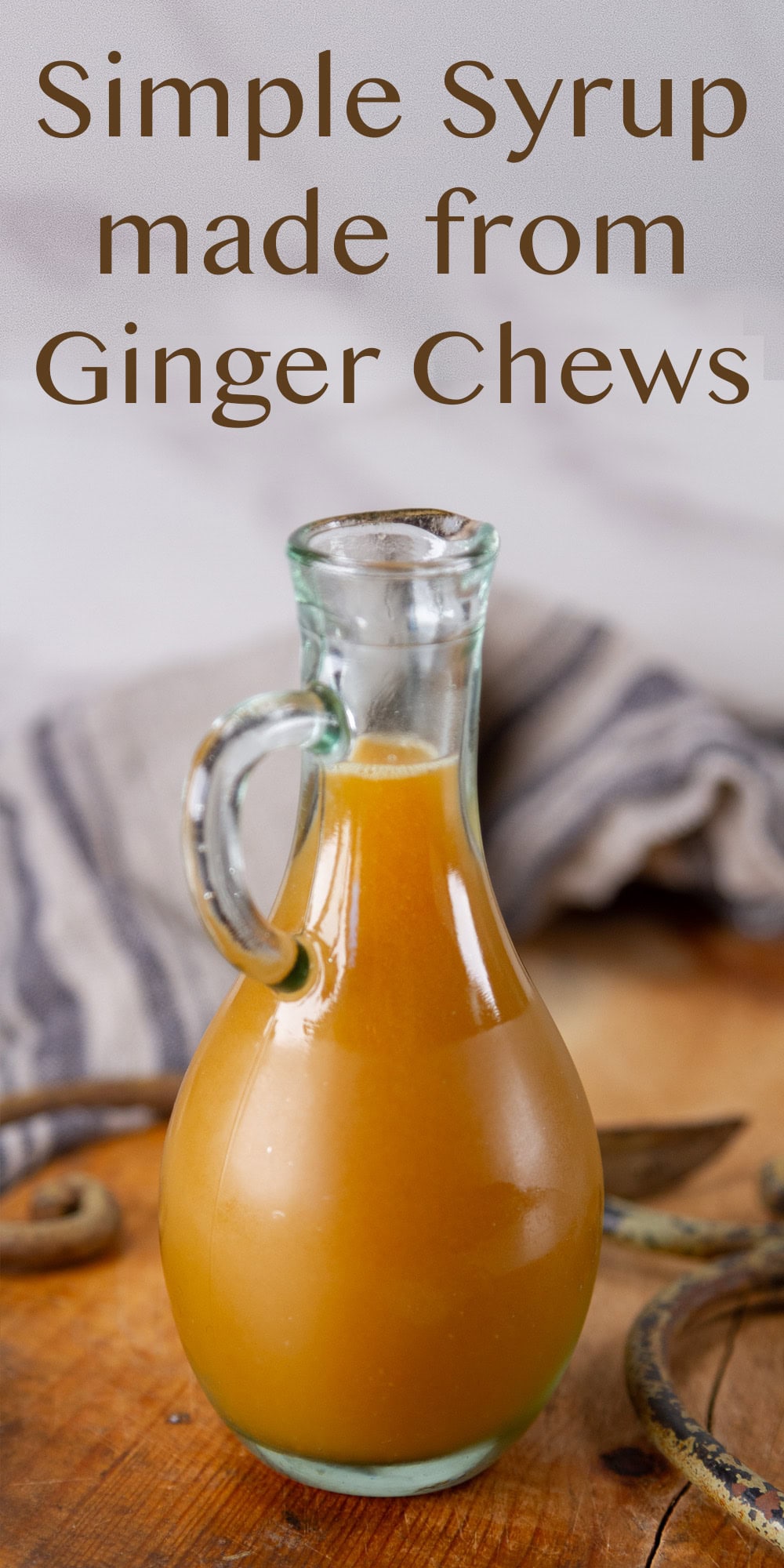 A glass bottle with syrup inside. 