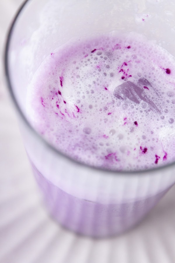 The top of a purple latte with cold foam.