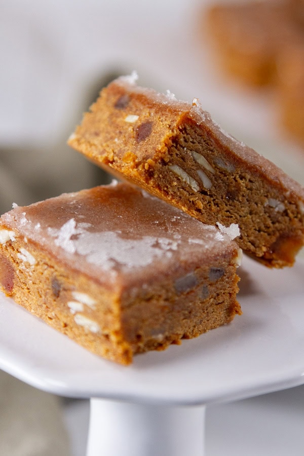 two gingerbread bars on a pedestal.