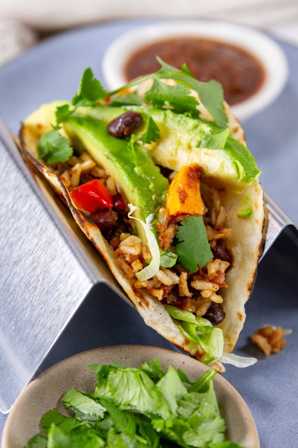 casserole made into tacos on a serving plate.
