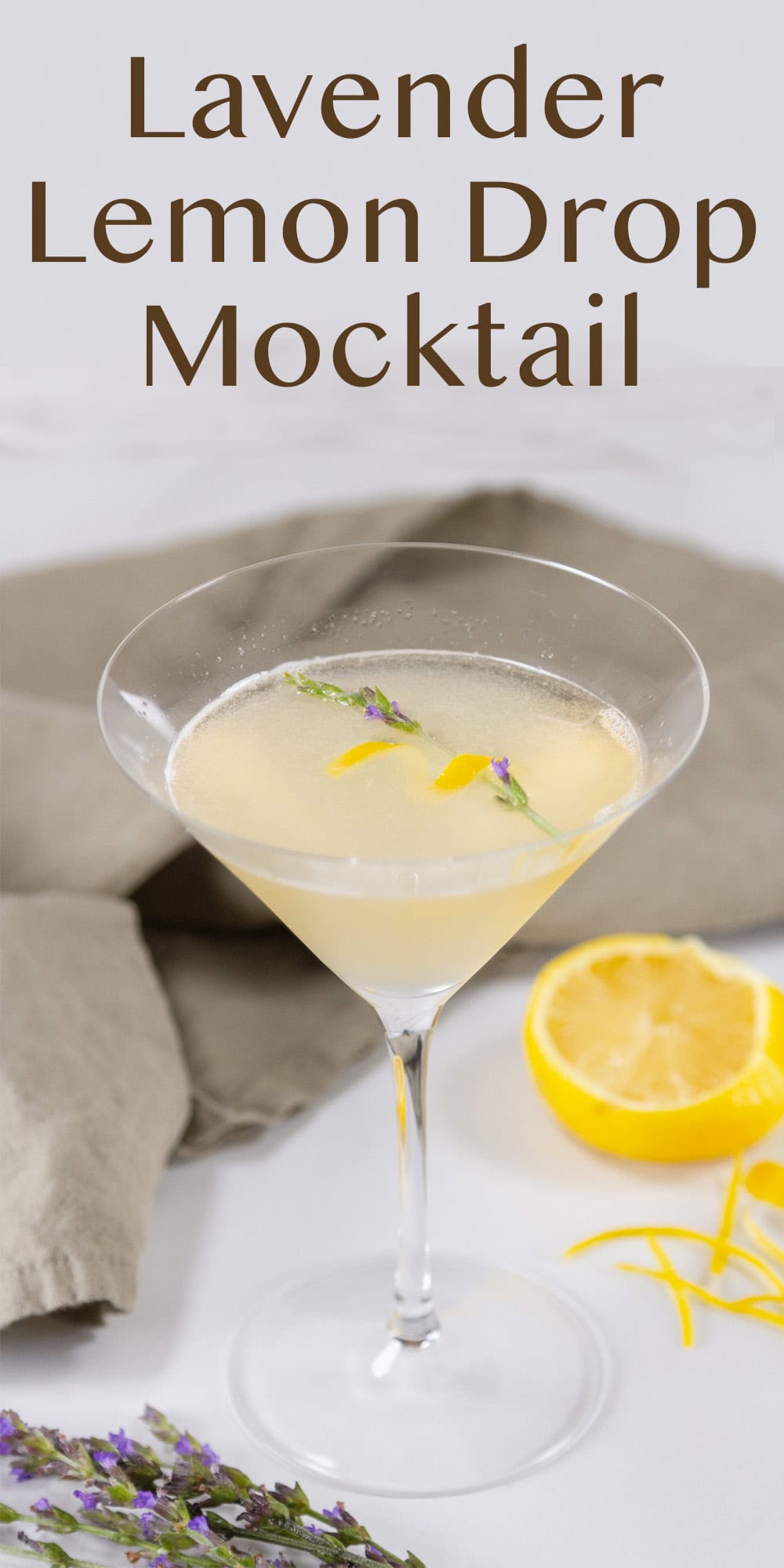 a martini glass filled with lemony drink.
