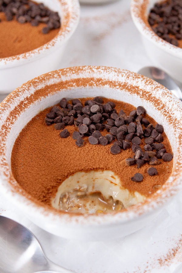 a bite taken out of the dessert so you can see the layers inside.