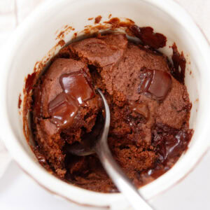 square crop looking down into a white mug filled with mug cake.