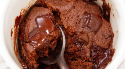 square crop looking down into a white mug filled with mug cake.