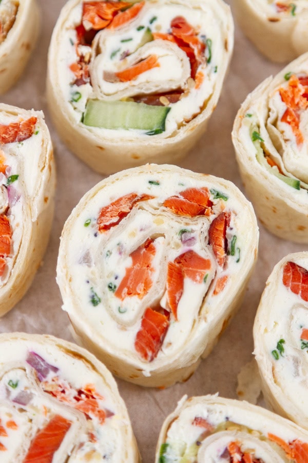several pinwheel appetizers on a serving plate.