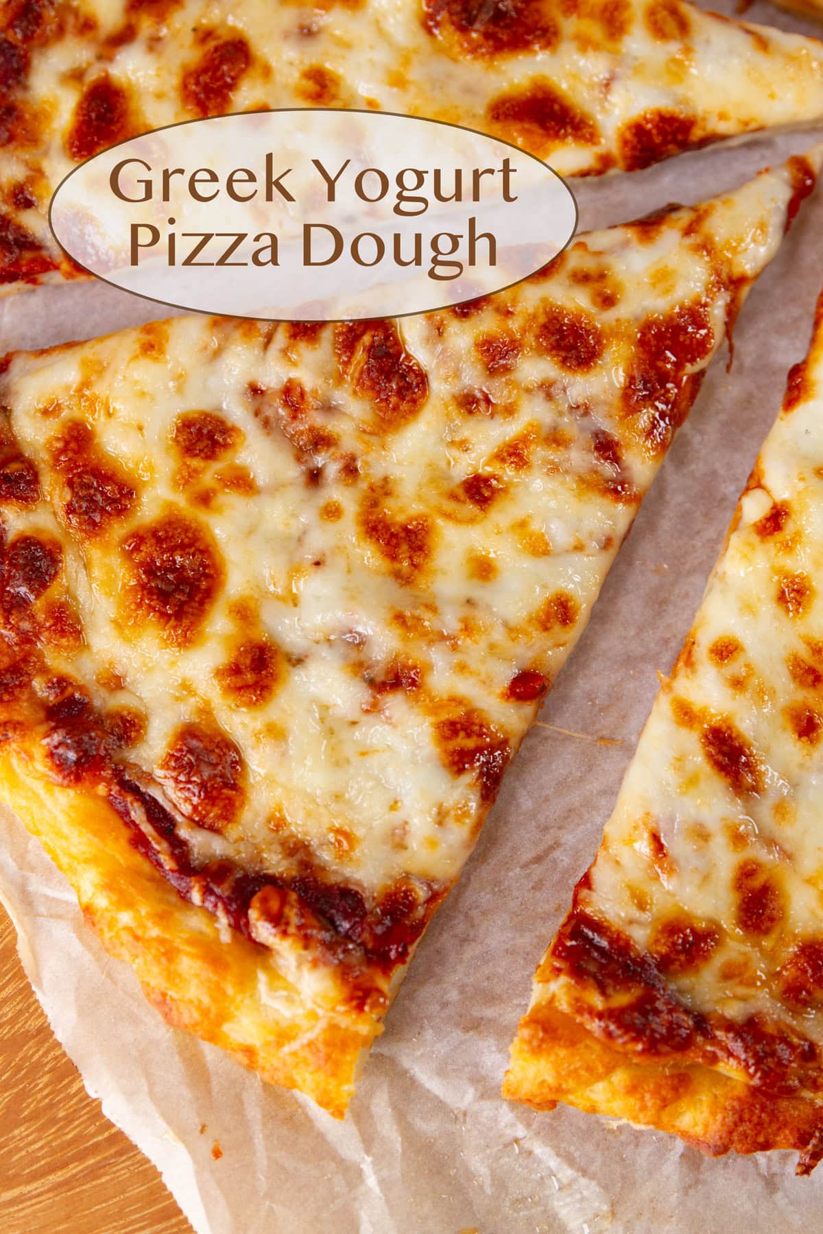 a slice of cheese pizza being taken out of the pizza.