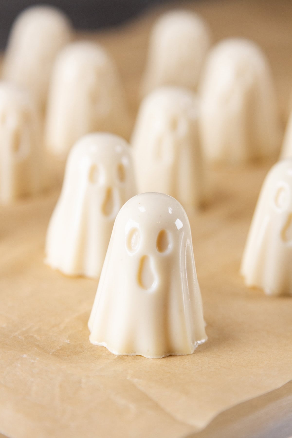 ghosts made of gelatin on a piece of parchment paper. 