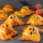 square crop of crescent ghosts on a black background.