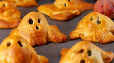 square crop of crescent ghosts on a black background.